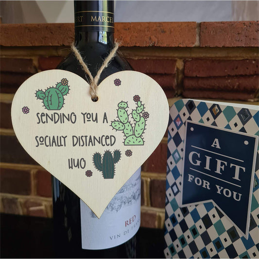 The Plum Penguin Handmade Wooden Hanging Heart Plaque Gift sending you a socially distanced hug miss you long distance novelty wall hanger cute fun cactus design for family friends grandparents